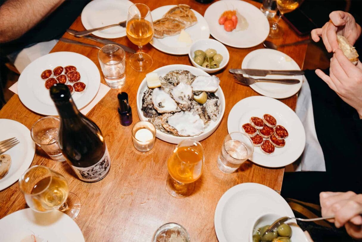 Top Cuvée restaurant, Islington - table serving of olives, oysters, saucisson and small plates