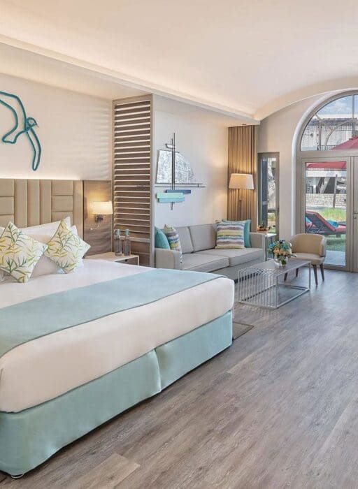A premium Garden Terrace Junior Suite at Palm Tree Court